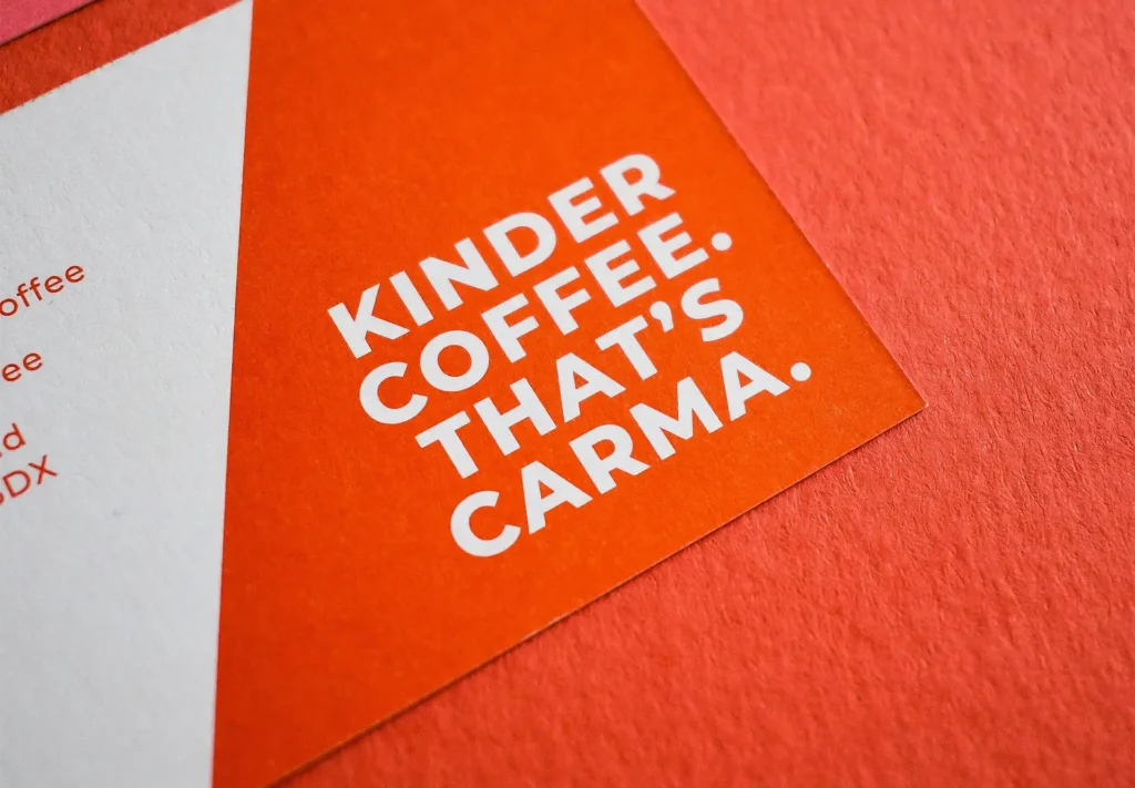 A striking coffee company business card showcasing the company slogan and vibrant colours, making a bold statement.