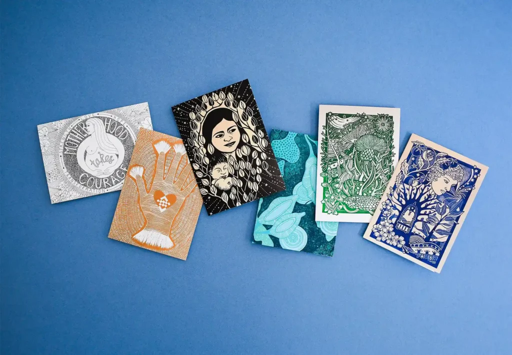 A charming collection of greeting cards featuring lino-cut illustrations.