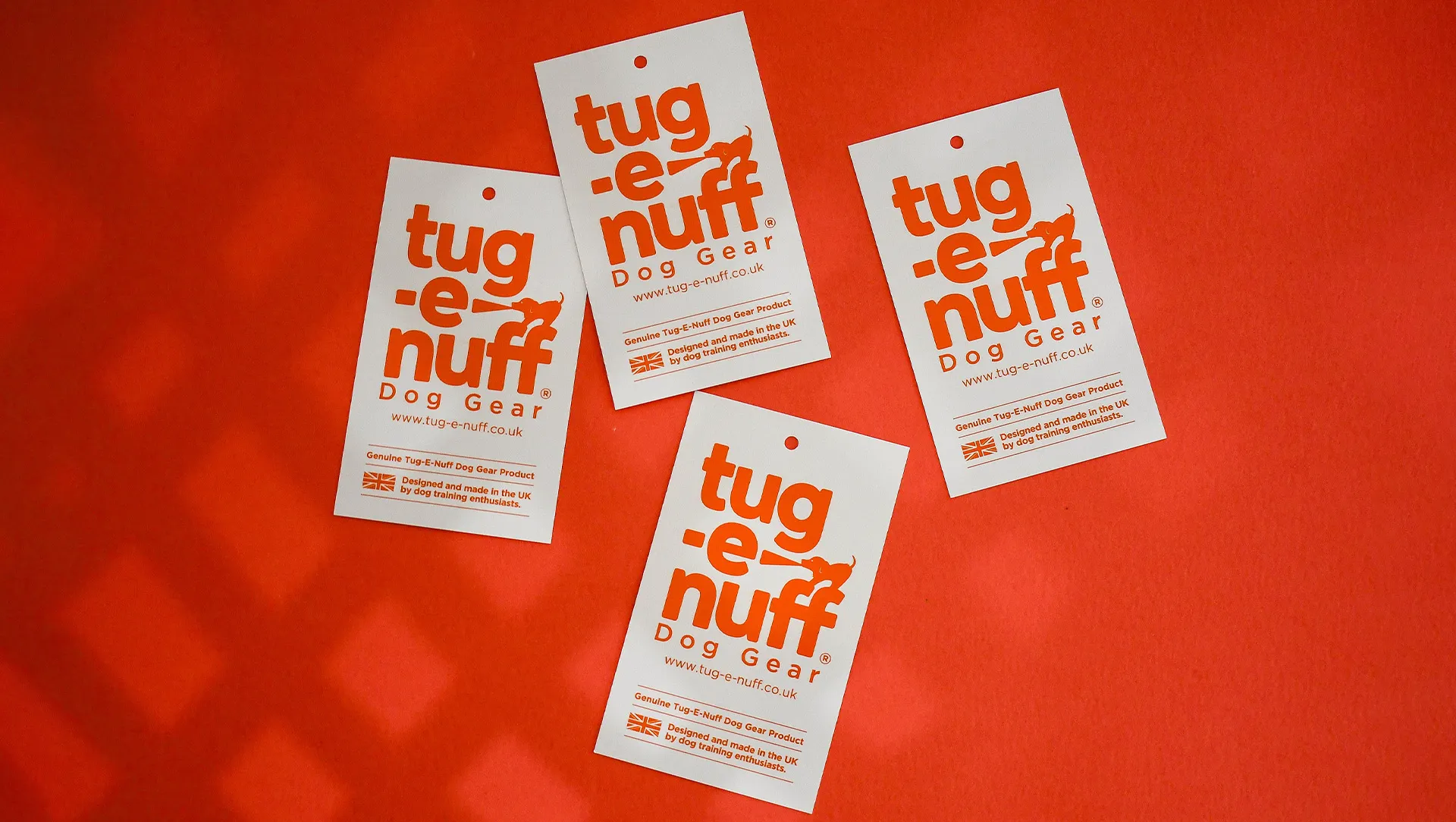 A collection of labels printed for Tug-E-Nuff, a dog gear company.