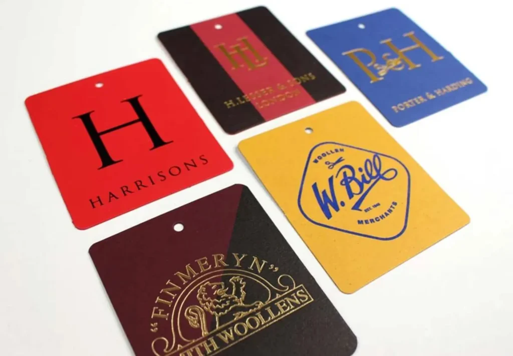 A diverse assortment of labels designed for various companies, showcasing the wide range of printing options available, from colours and textures to finishes and styles.