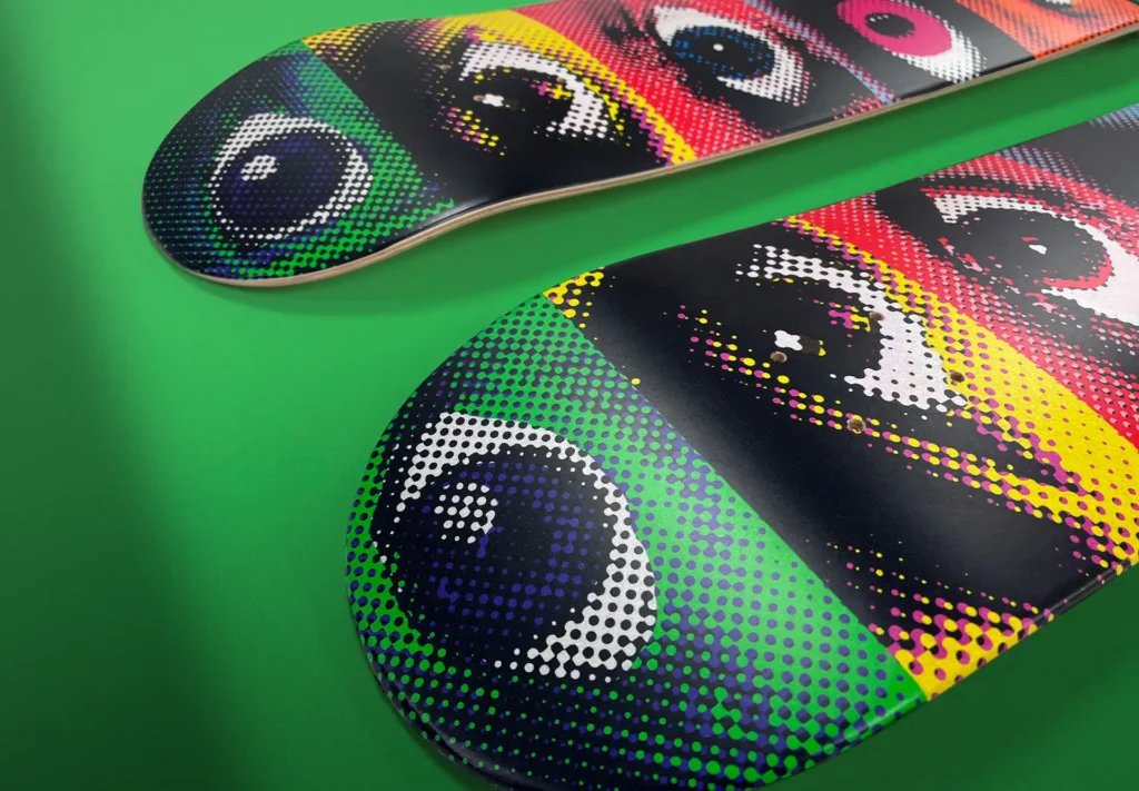 Skateboards wrapped in vibrant custom designs, featuring unique artwork and graphics, ideal for personalising your ride and showcasing individual style.