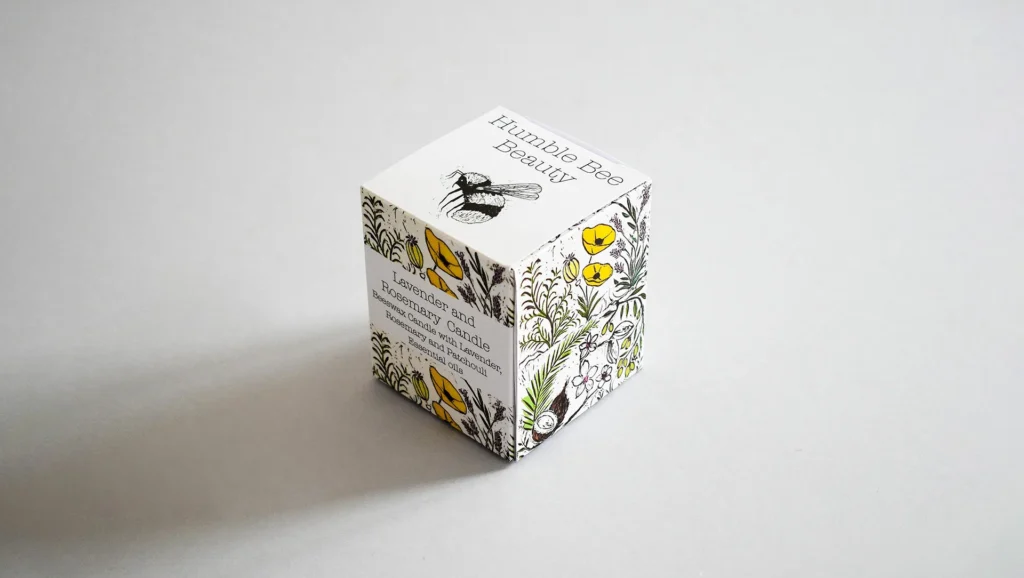 Packaging printed for a lavender and rosemary candle from Humble Bee Beauty, reflecting elegance and charm.