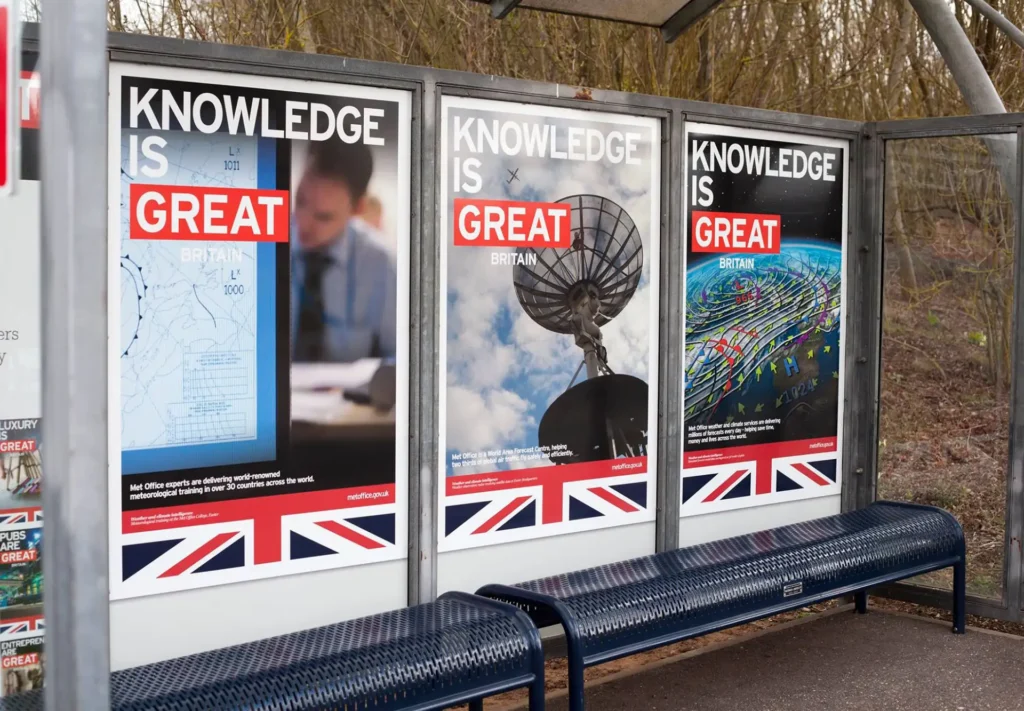 Set of three vibrant, high-quality posters installed at a bus stop allowing maximum visibility and engagement with commuters.