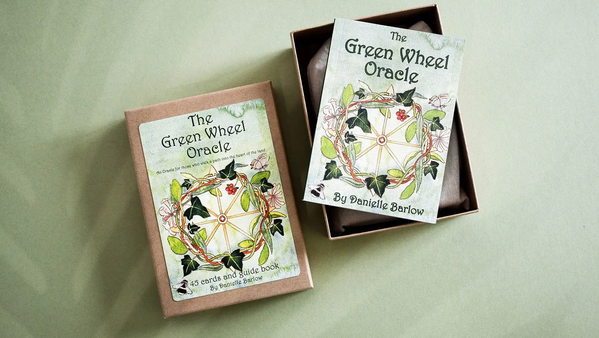 A package for 'The Green Oracle Wheel,' including 45 cards and a guidebook, designed to inspire and guide users on their journey towards environmental consciousness.