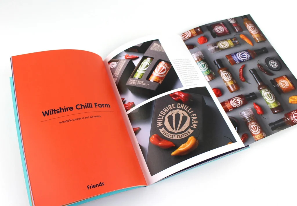 Close-up of a lithographic printed brochure displaying vivid, bold colours and intricate print details, highlighting its premium quality and vibrant design.