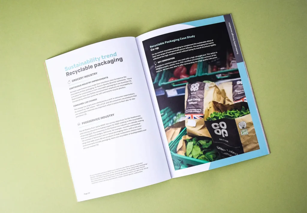 The inner spread of a magazine focused on recyclable packaging for the Co-op Group, highlighting their commitment to sustainability and eco-friendly initiatives.